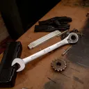 Adjustable wrench with ratchet and retaining ring. - 11